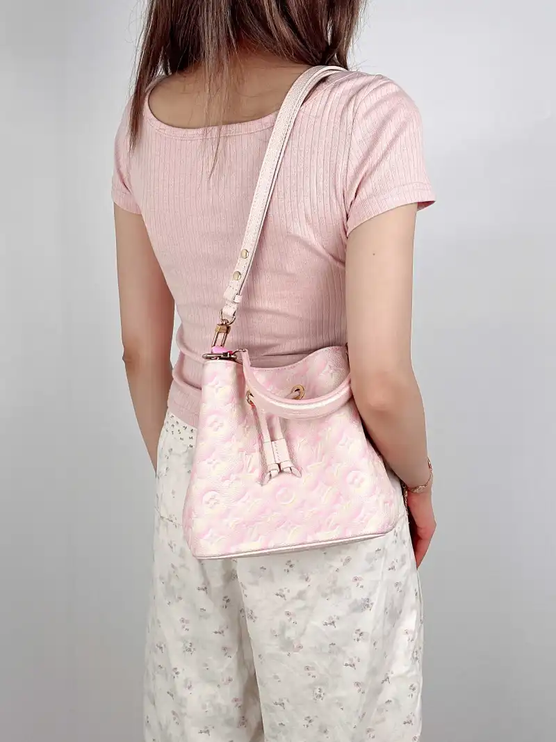 Louis Vuitton Crossbody Bag NÉONOÉ Bucket Bag BB Collection · Calfskin BB 20 × 13 × 20 cm — on-model view 3 of 3