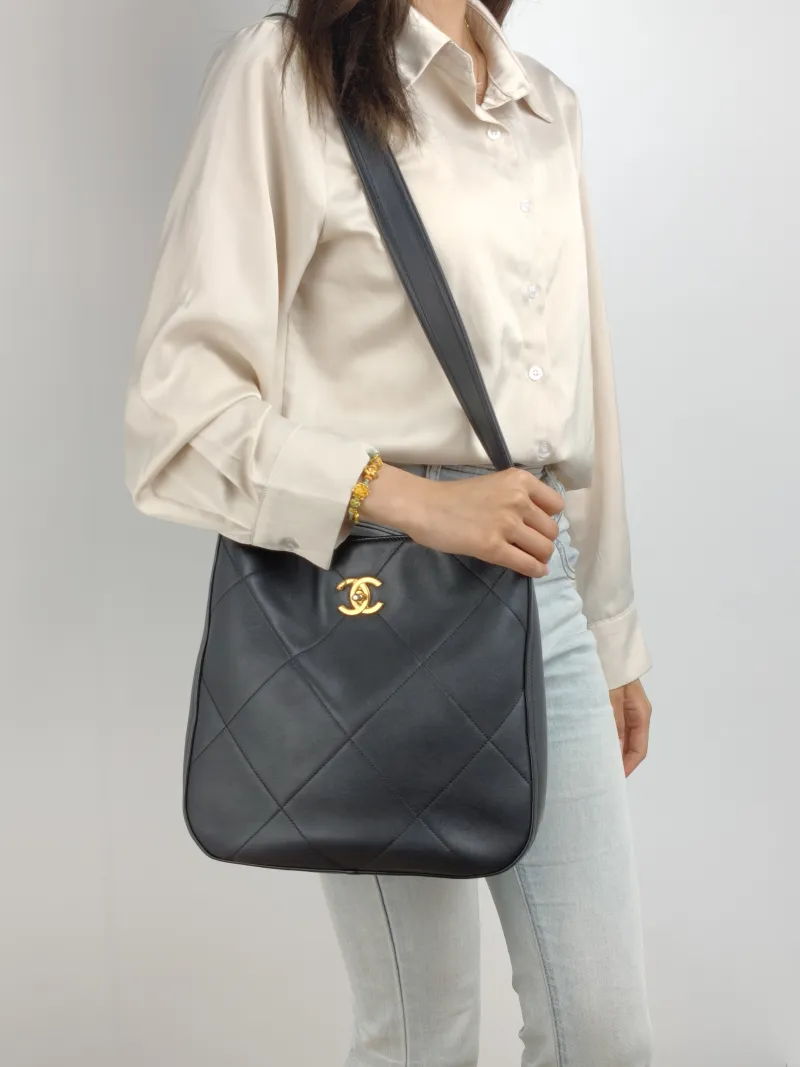 Chanel Shoulder Bag hobo Black Calfskin One Size 27 × 7 × 27 cm — on-model view 1 of 2