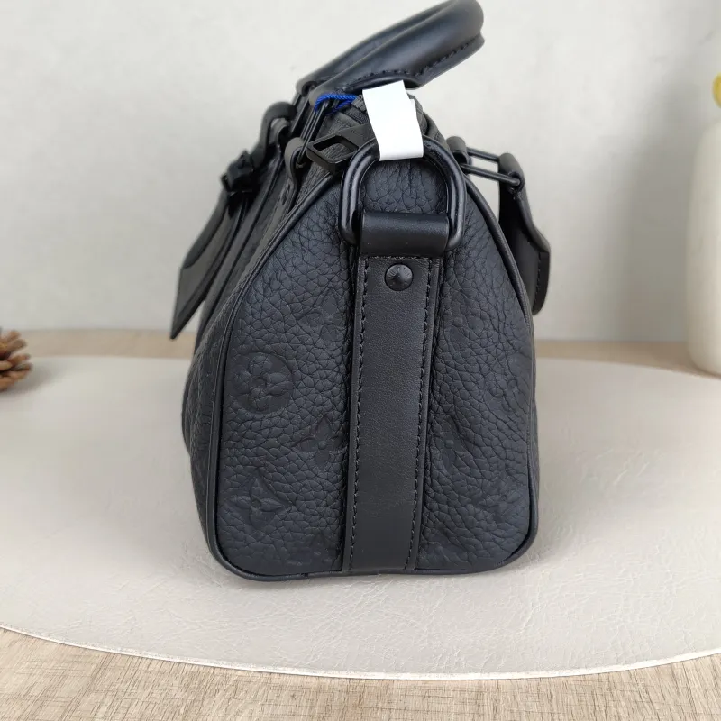 Louis Vuitton Crossbody Bag Keepall 25 Taurillon Embossed Calfskin Monogram Medium25 × 11 × 15 cm — detail view 9 of 12