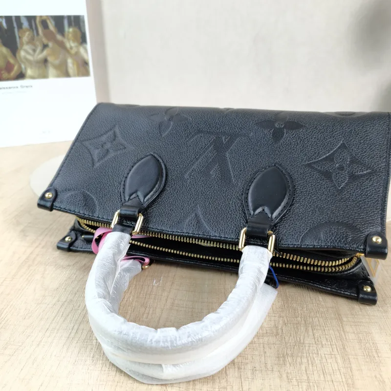 Louis Vuitton Crossbody Bag Onthego East West Two Straps Black Empreinte Embossed Calfskin Small 25 × 10 × 13 cm — detail view 8 of 12