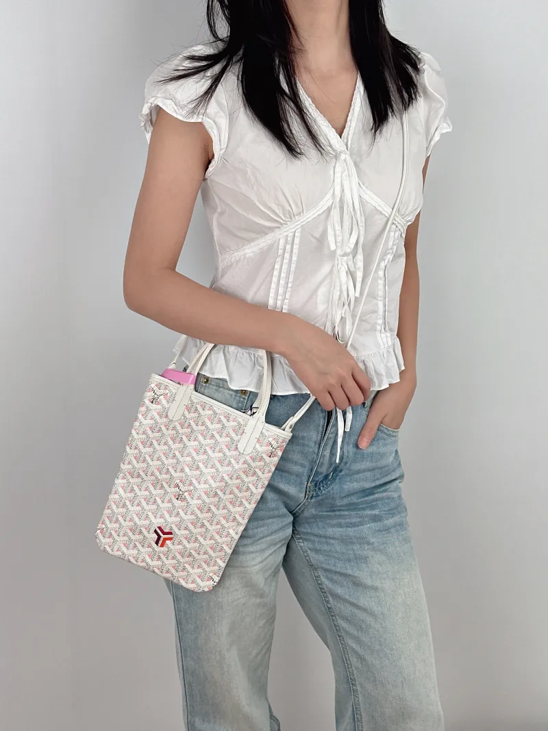 GOYARD Crossbody Bag poitiers y Tote Bag White PVC Small 21 × 1 × 24 cm — on-model view 3 of 3