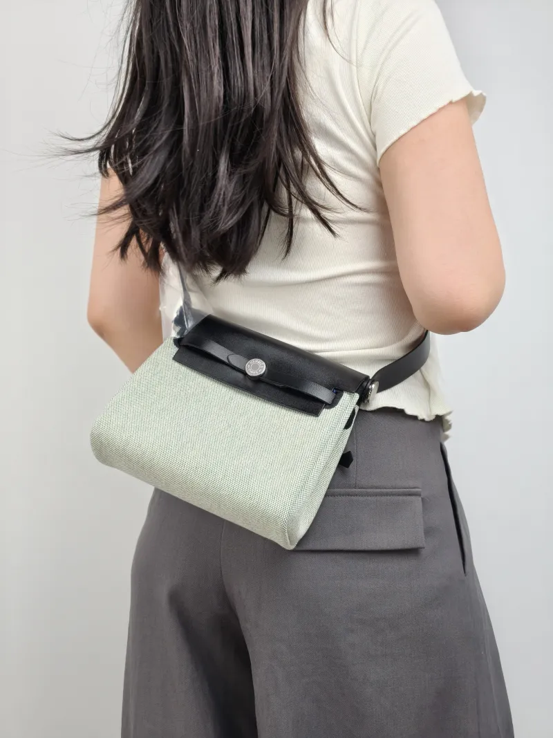 Hermès Crossbody Bag Herbag Zip 20 Beige · Green · Black Calfskin，Canvas Mini 20.5 × 7 × 16.5 cm G — on-model view 1 of 2