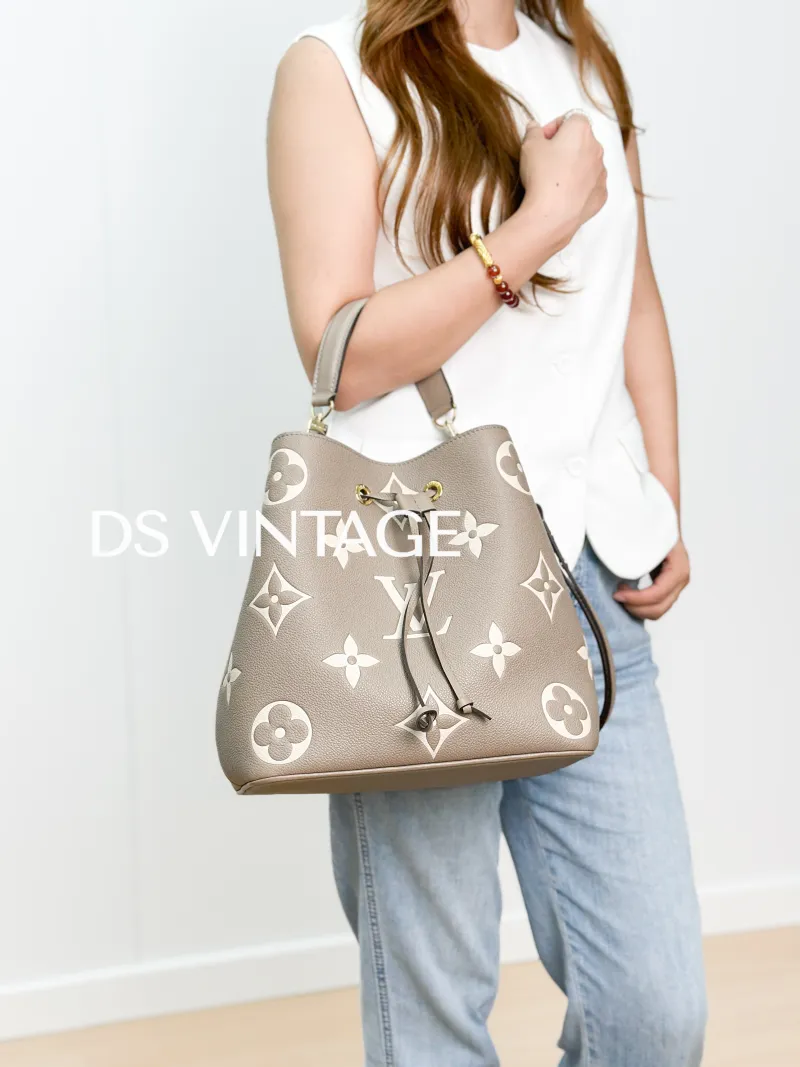 Louis Vuitton Crossbody Bag NANO NOÉ Bucket Bag Nano · White Empreinte Embossed Calfskin nano 13 × 10 × 16 cm — on-model view 1 of 3