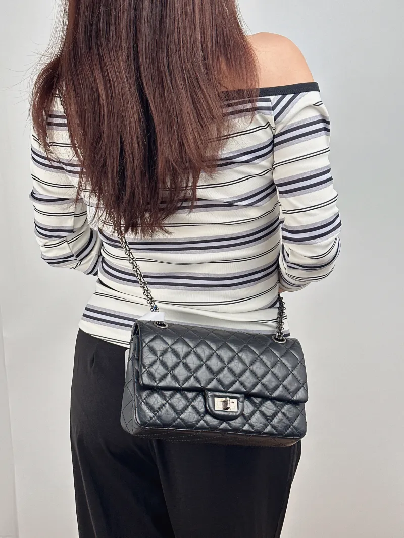 Chanel Shoulder Bag 2.55 Black Calfskin Small 24 × 7.5 × 16 cm 18 — on-model view 1 of 2