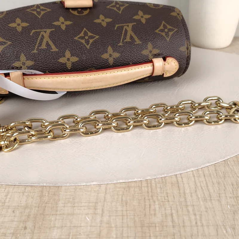 Louis Vuitton Crossbody Bag Pochette Métis East West Monogram PVC Small 21.5 × 6 × 13.5 cm — detail view 15 of 16
