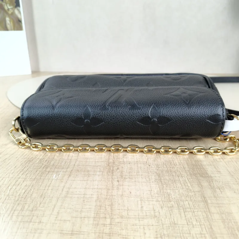 Louis Vuitton Crossbody Bag IVY Black Empreinte Embossed Calfskin Monogram Small23.5 × 4.3 × 12 cm — detail view 1 of 13