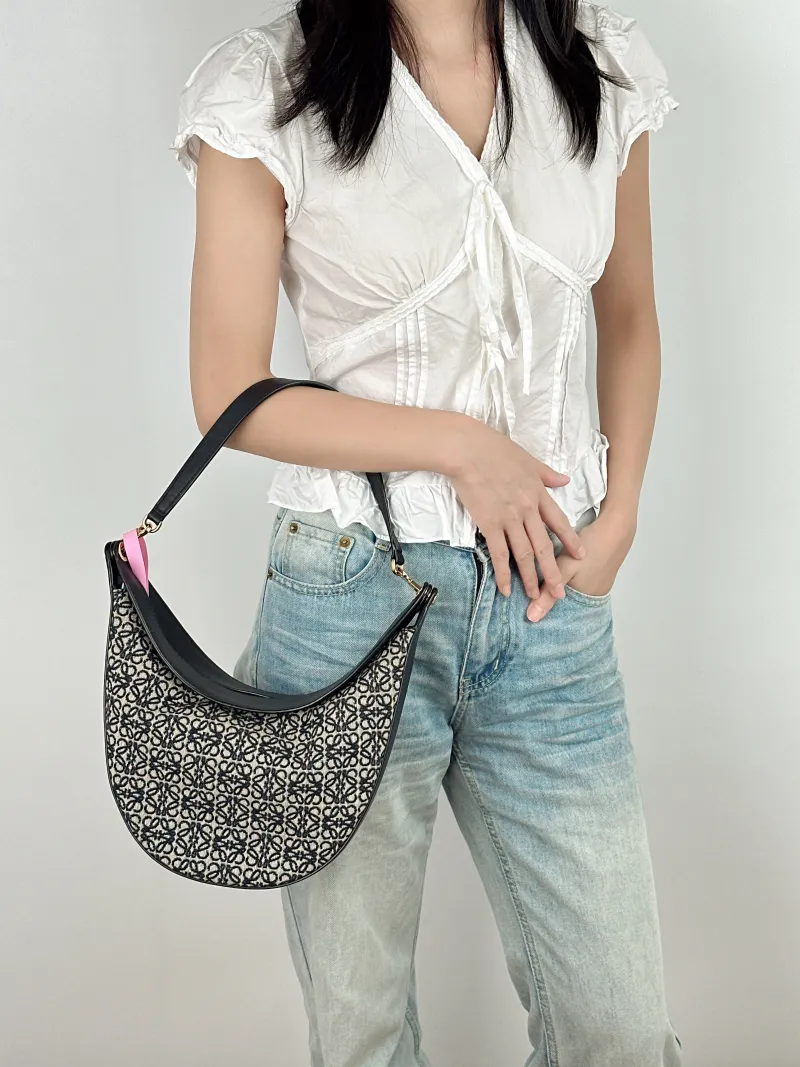 LOEWE Shoulder Bag luna Shoulder Bag Black Canvas One Size 30 × 8 × 28 cm — on-model view 2 of 2