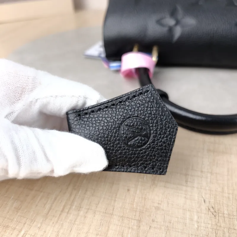 Louis Vuitton Crossbody Bag MADELEINE Black Monogram Empreinte Embossed Calfskin BB 24 × 8.5 × 17 cm — detail view 7 of 12