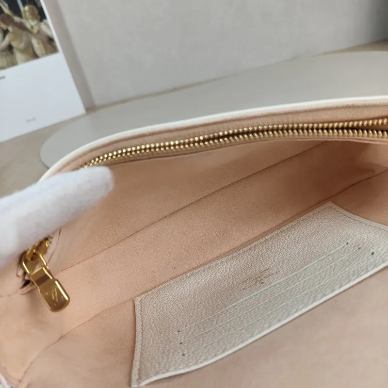 Louis Vuitton Crossbody Bag IVY White · Pink Monogram Empreinte Embossed Calfskin Small 23.5 × 4.3 × 12 cm — detail view 8 of 11