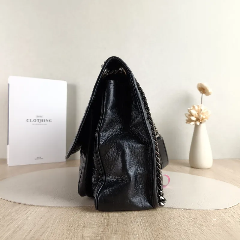 SAINT LAURENT Crossbody Bag Niki Black Calfskin Large 32 × 9 × 23 cm — detail view 8 of 13