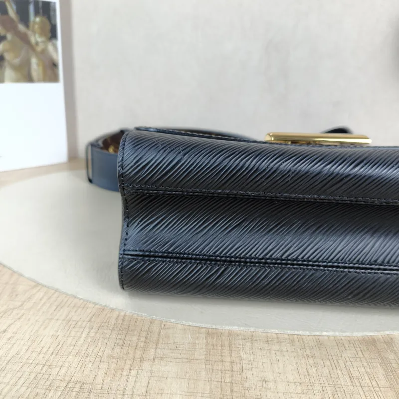 Louis Vuitton Crossbody Bag Twist Black Epi Embossed Calfskin Medium 23 × 9.5 × 17 cm — detail view 10 of 13