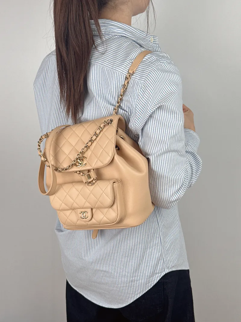 Chanel Backpack Duma Beige Calfskin Large 21 × 13 × 23 cm — on-model view 1 of 2