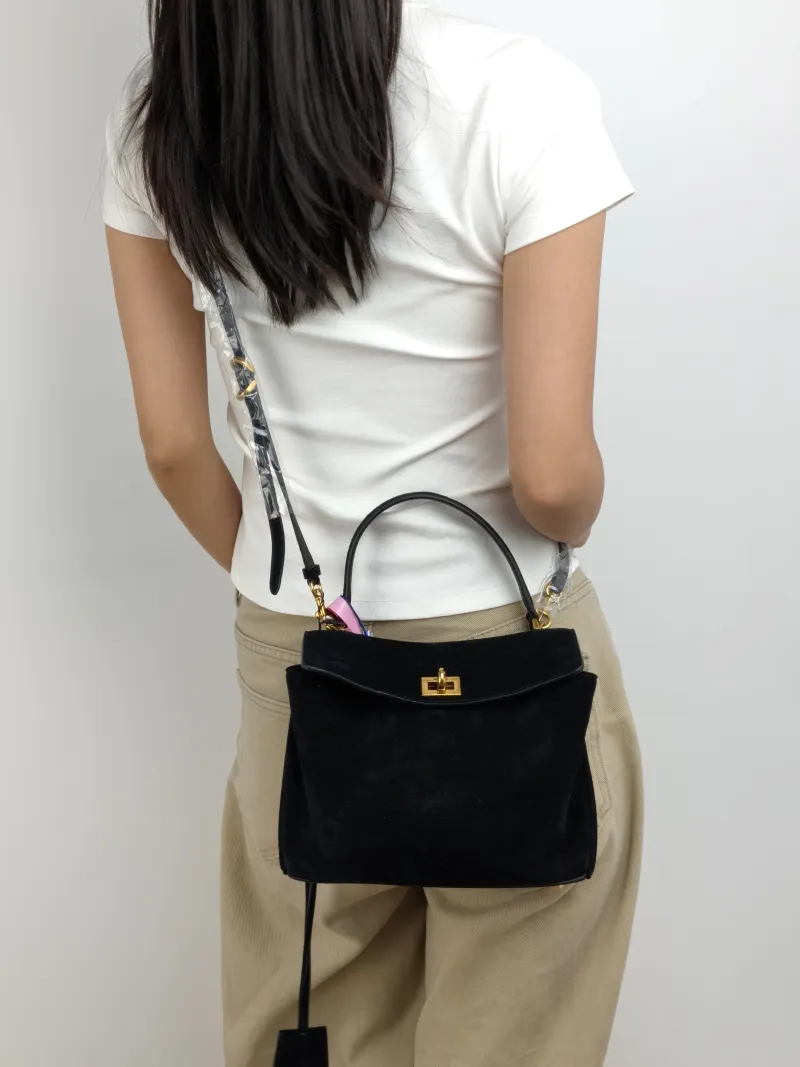 BALENCIAGA Crossbody Bag RODEO Black Suede Mini 23 × 10 × 17 cm — on-model view 2 of 2