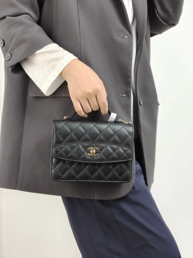 Chanel Backpack Backpack Black Grained Calfskin One Size 18.2 × 5 × 14 cm — on-model view 1 of 2