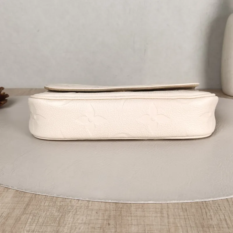 Louis Vuitton Crossbody Bag IVY White Monogram Empreinte Embossed Calfskin Small 23.5 × 4.3 × 12 cm — cover view 2 of 6
