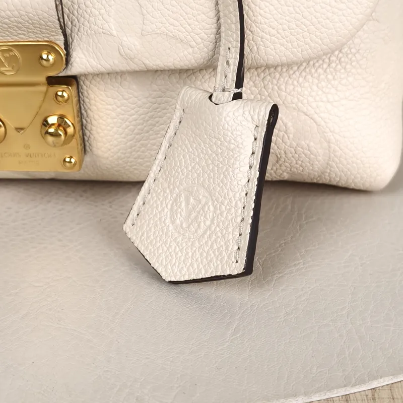 Louis Vuitton Crossbody Bag MADELEINE White Monogram Empreinte Embossed Calfskin BB 24 × 8.5 × 17 cm — detail view 3 of 14