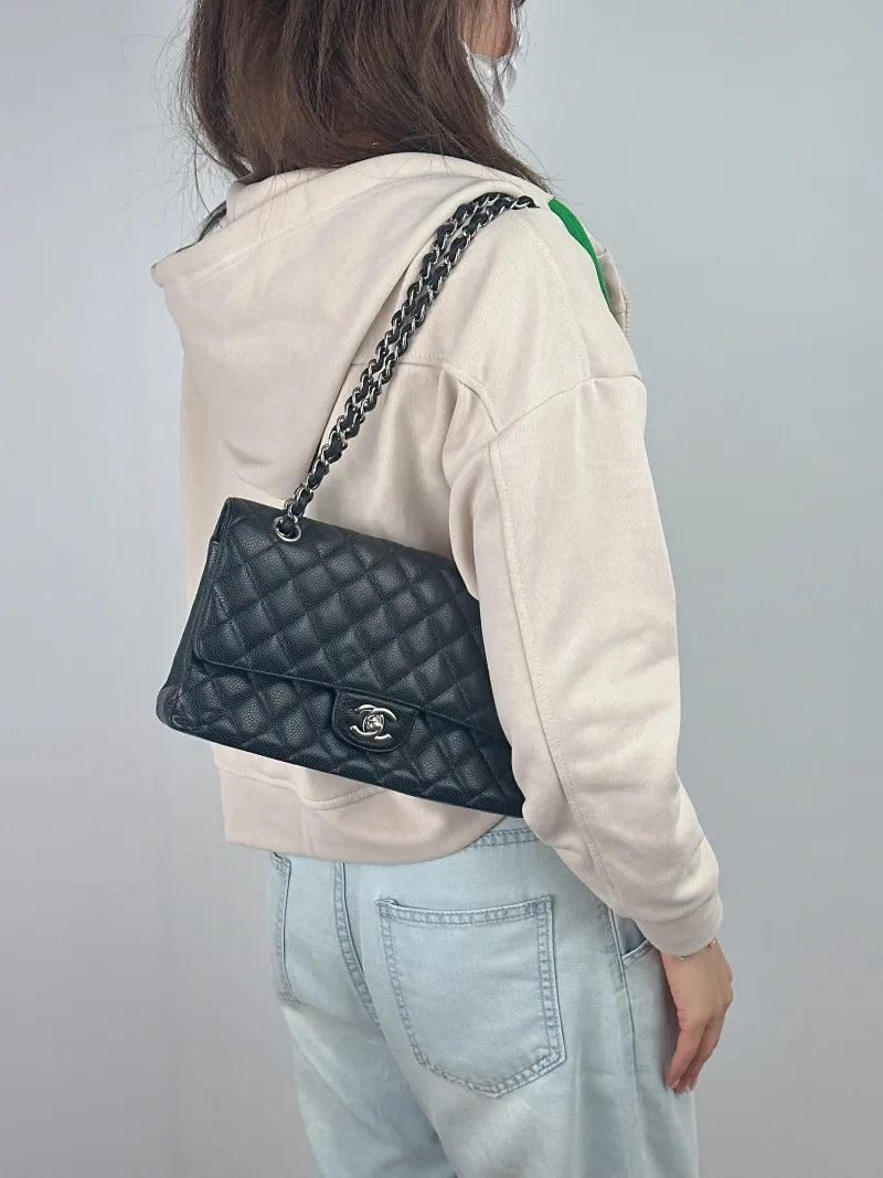Chanel Crossbody Bag Classic Flap CF Black Grained Calfskin Medium 25.5 × 6.5 × 15.5 cm 23 — on-model view 2 of 2