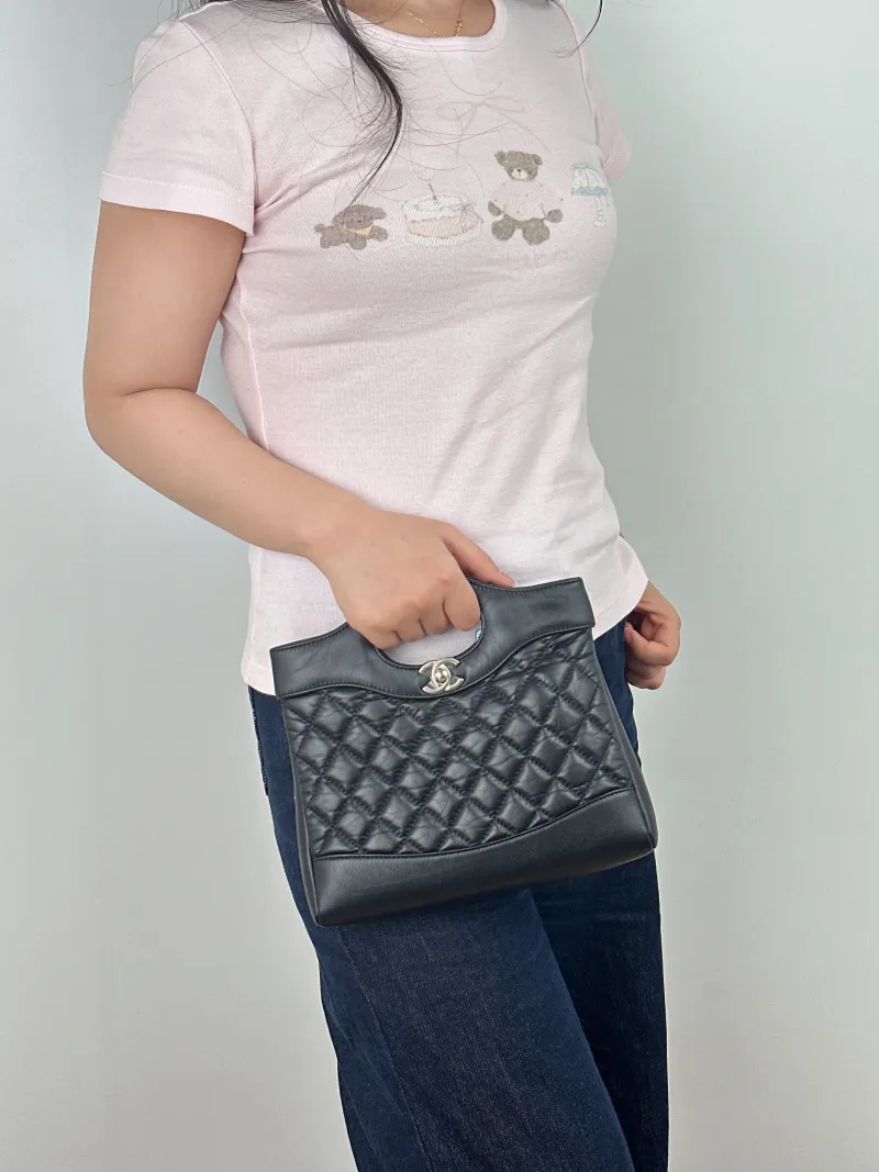 Chanel Crossbody Bag 31Bag Black Calfskin Mini 23 × 5.5 × 22 cm — on-model view 1 of 2