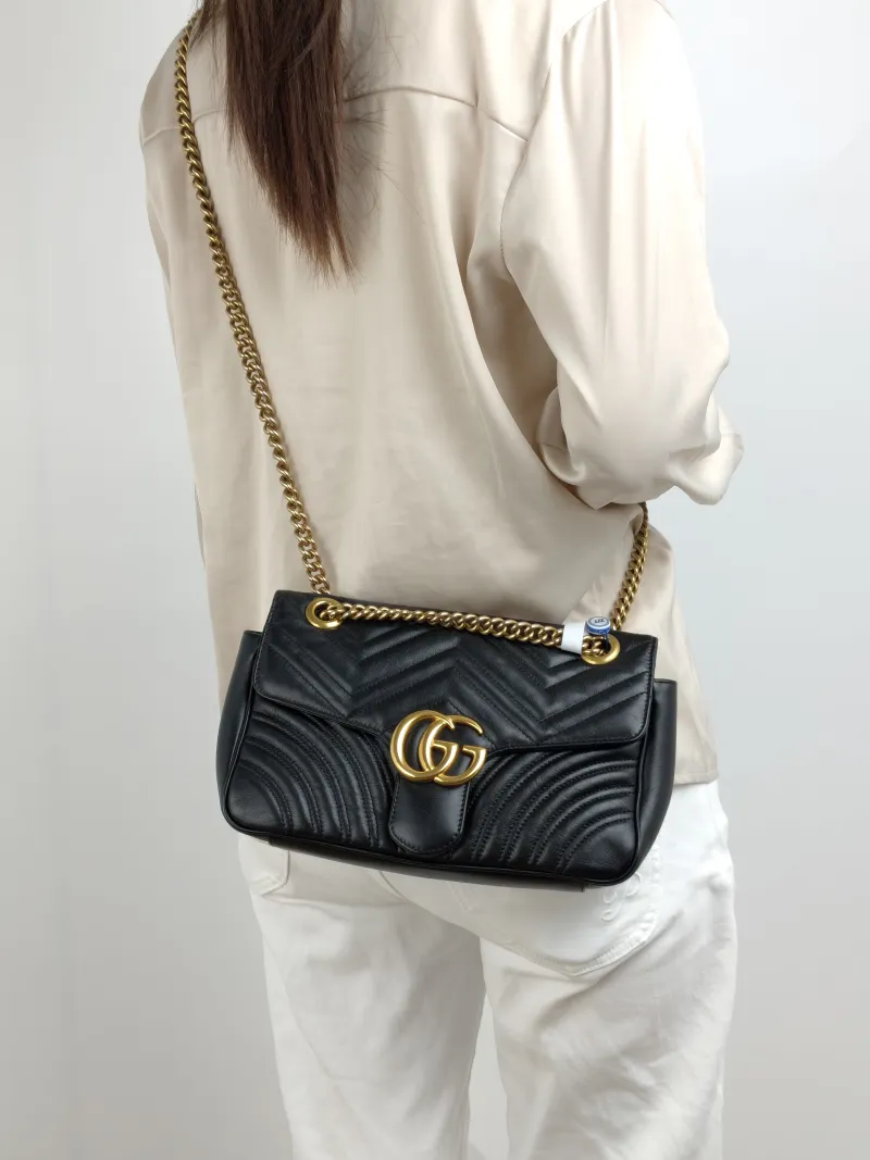 GUCCI Crossbody Bag GG Marmont Medium Marmont 26 Black CC alfskin Medium 26 × 7 × 15 cm — on-model view 1 of 2