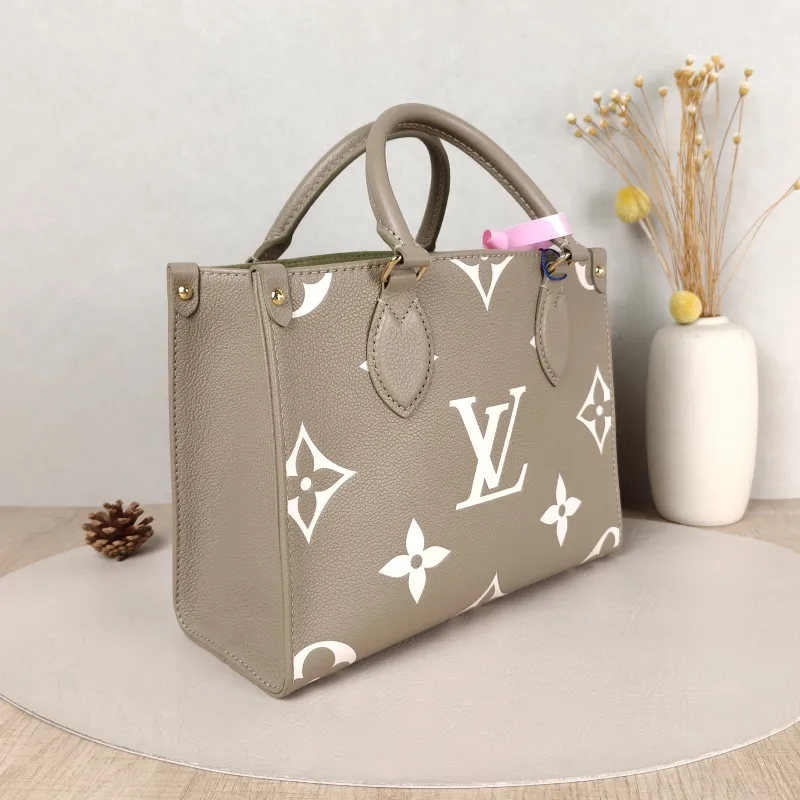 Louis Vuitton Top Handle Bag Onthego Monogram Empreinte Embossed Calfskin Small 25 × 11.5 × 19 cm — cover view 3 of 5