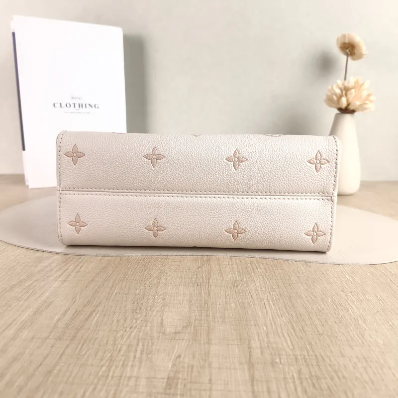 Louis Vuitton Shoulder Bag Onthego Beige · Pink Empreinte Embossed Calfskin Small 25 × 11.5 × 19 cm — cover view 4 of 6