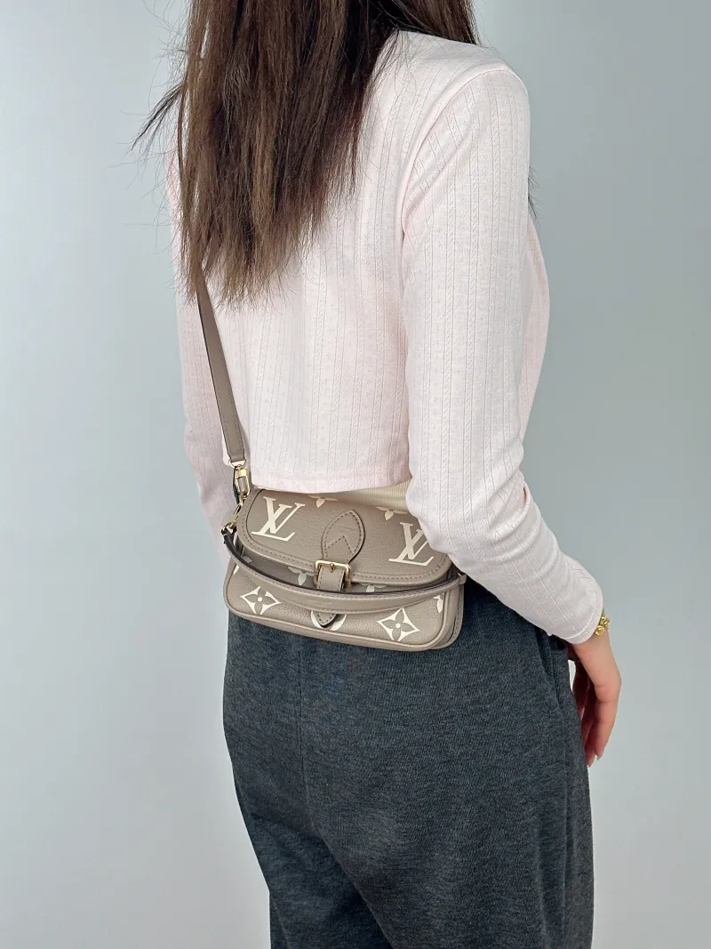 Louis Vuitton Crossbody Bag Diane Baguette Bag Empreinte Embossed Calfskin Monogramnano19 × 6 × 10.5 cm — on-model view 1 of 2