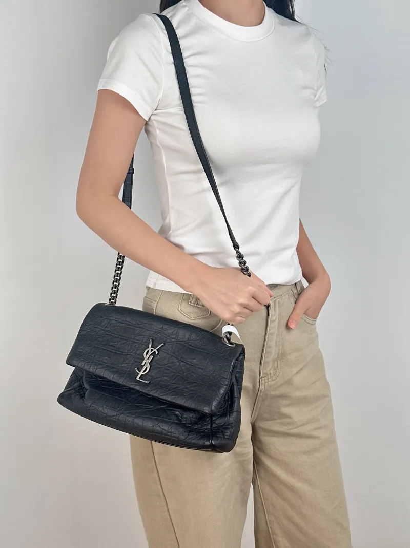 SAINT LAURENT Shoulder Bag Shoulder Bag Black Calfskin One Size 28 × 10 × 17 cm — on-model view 1 of 2