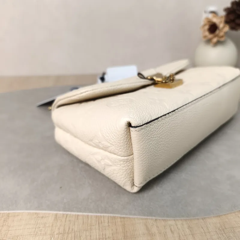 Louis Vuitton Crossbody Bag MADELEINE White Empreinte Embossed Calfskin nano 21 × 6 × 12.5 cm — detail view 3 of 11