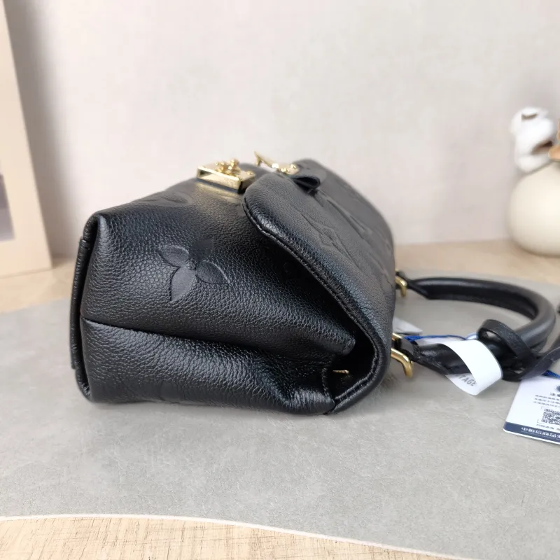 Louis Vuitton Crossbody Bag MADELEINE Black Empreinte Embossed Calfskin BB 24 × 8.5 × 17 cm — detail view 4 of 12