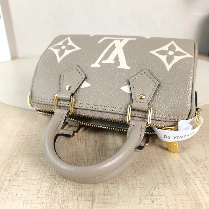 Louis Vuitton Crossbody Bag Speedy Nano · White Monogram Empreinte Embossed Calfskin nano 16 × 7.5 × 10 cm — detail view 1 of 11