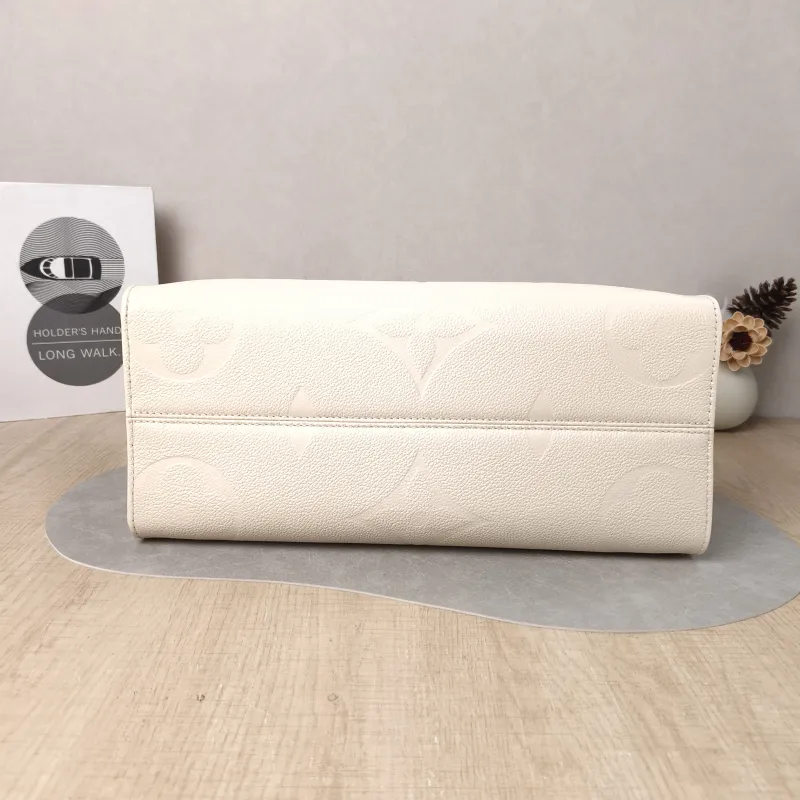 Louis Vuitton Shoulder Bag Onthego Medium White Monogram Empreinte Embossed Calfskin Medium 35 × 14 × 27 cm — cover view 3 of 5