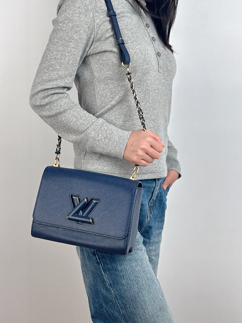 Louis Vuitton Crossbody Bag Twist Blue Calfskin Medium 23 × 9.5 × 17 cm — on-model view 2 of 2
