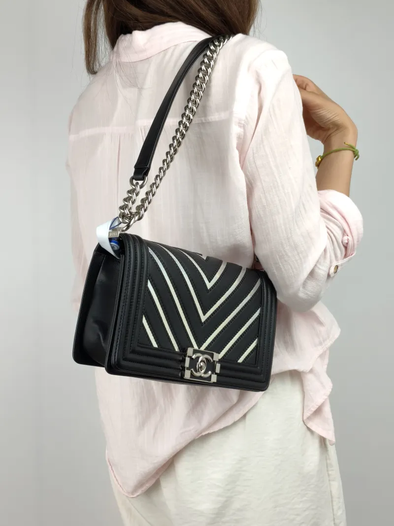Chanel Crossbody Bagv leboy Black Lambskin Medium25 × 9 × 15 cm — on-model view 2 of 3