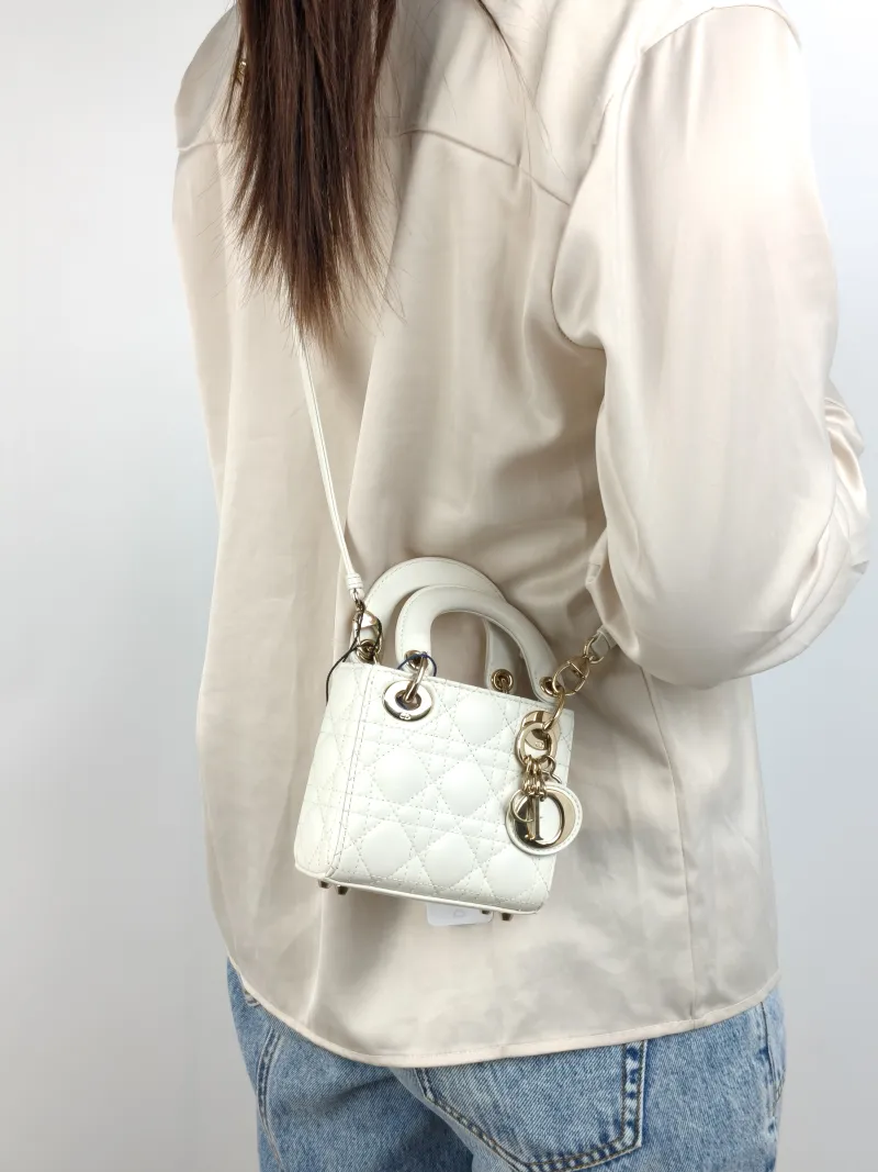 DIOR Crossbody Bag Lady Lady Dior Bag White Lambskin Mini 12 × 5 × 10 cm — on-model view 1 of 3