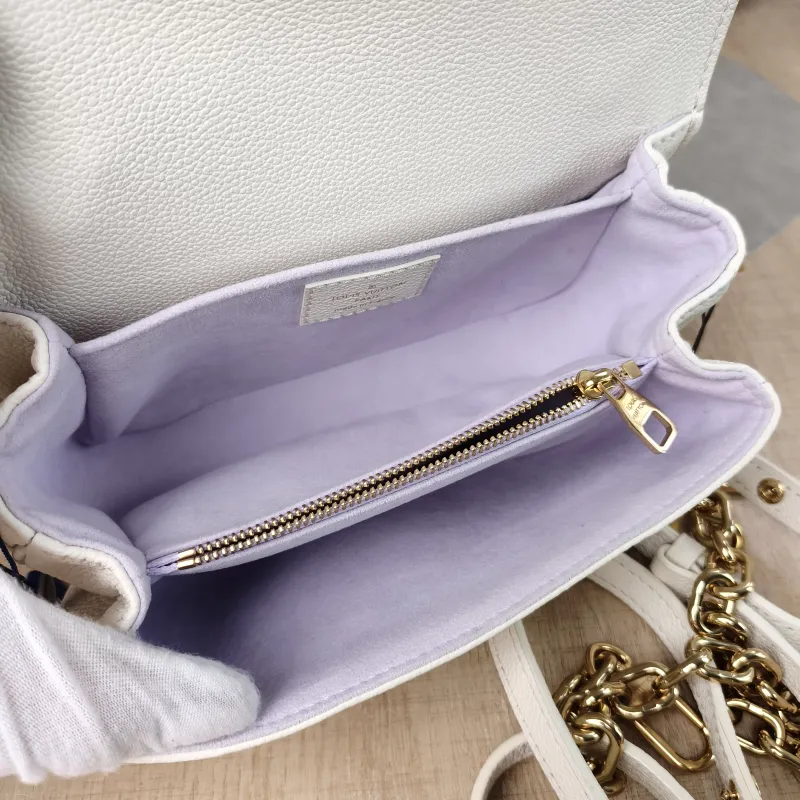 Louis Vuitton Crossbody Bag Pochette Métis East West White · Monogram Empreinte Embossed Calfskin Small 21.5 × 6 × 13.5 cm — detail view 3 of 14