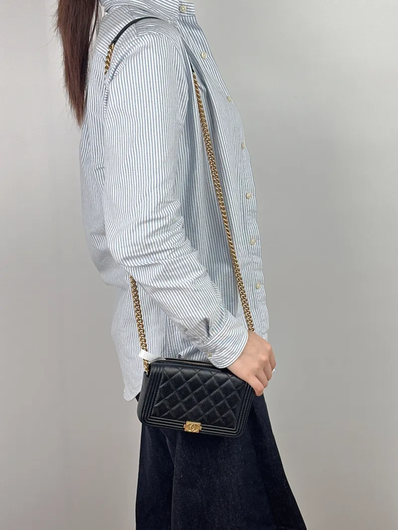 Chanel Crossbody Bag Le Boy​ WOC Black Grained Calfskin Mini 17.5 × 3.5 × 10 cm Microchip Edition — on-model view 1 of 2