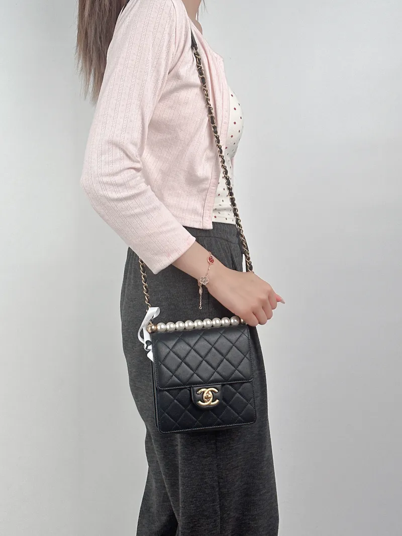 Chanel Crossbody Bag Crossbody Bag Black Calfskin15.5 × 5 × 15 cm — on-model view 1 of 3