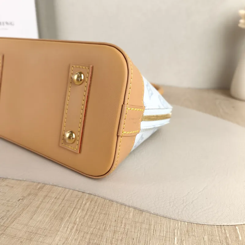 Louis Vuitton Top Handle Bag Alma BB Blue PVC BB 23.5 × 11.5 × 17.5 cm — detail view 11 of 11