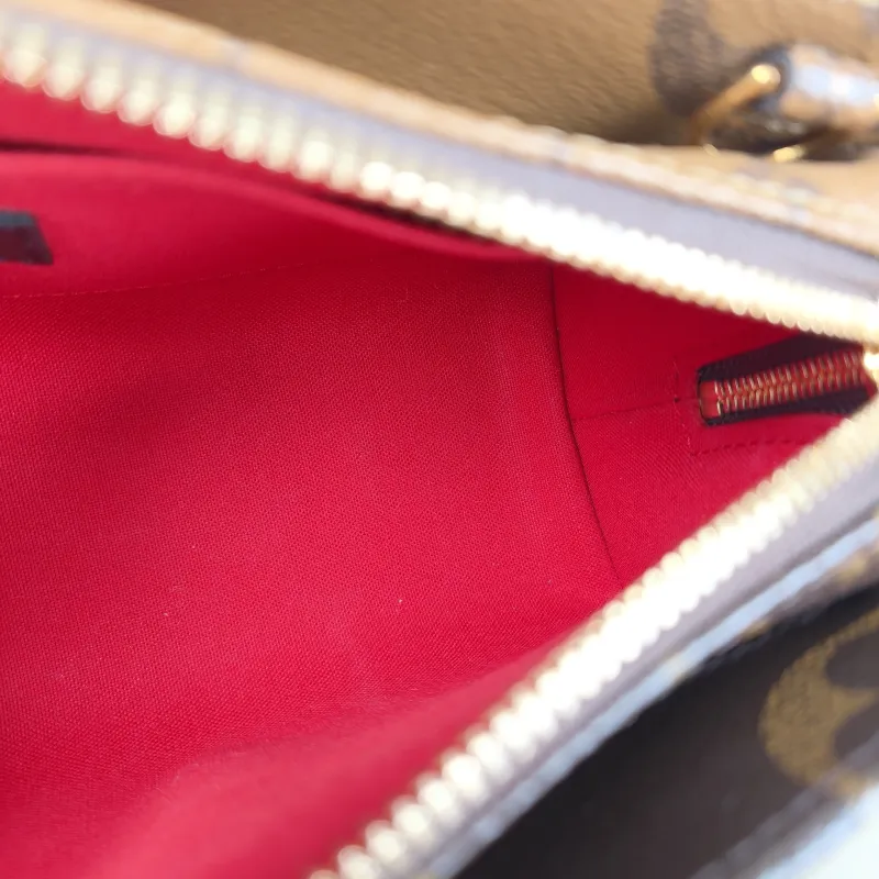 Louis Vuitton Crossbody Bag Onthego East West Monogram PVC Small 25 × 10 × 13 cm — detail view 15 of 15