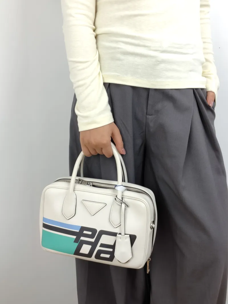 PRADA Top Handle Bag Tote Bag White Calfskin 26 × 18.5 × 16.5 cm — on-model view 2 of 2