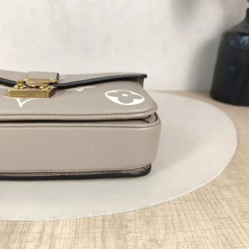 Louis Vuitton Crossbody Bag Pochette Métis East West Monogram Empreinte Embossed Calfskin Small 21.5 × 6 × 13.5 cm — detail view 5 of 13