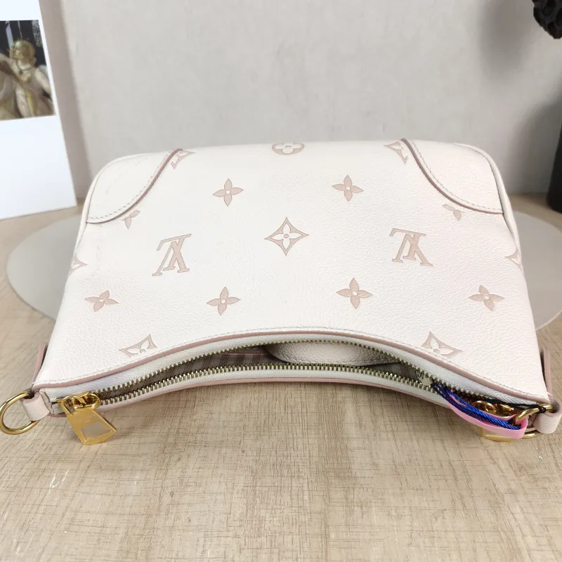 Louis Vuitton Crossbody Bag Boulogne Beige Monogram Empreinte Embossed Calfskin Small 26 × 9.5 × 16 cm — detail view 5 of 11