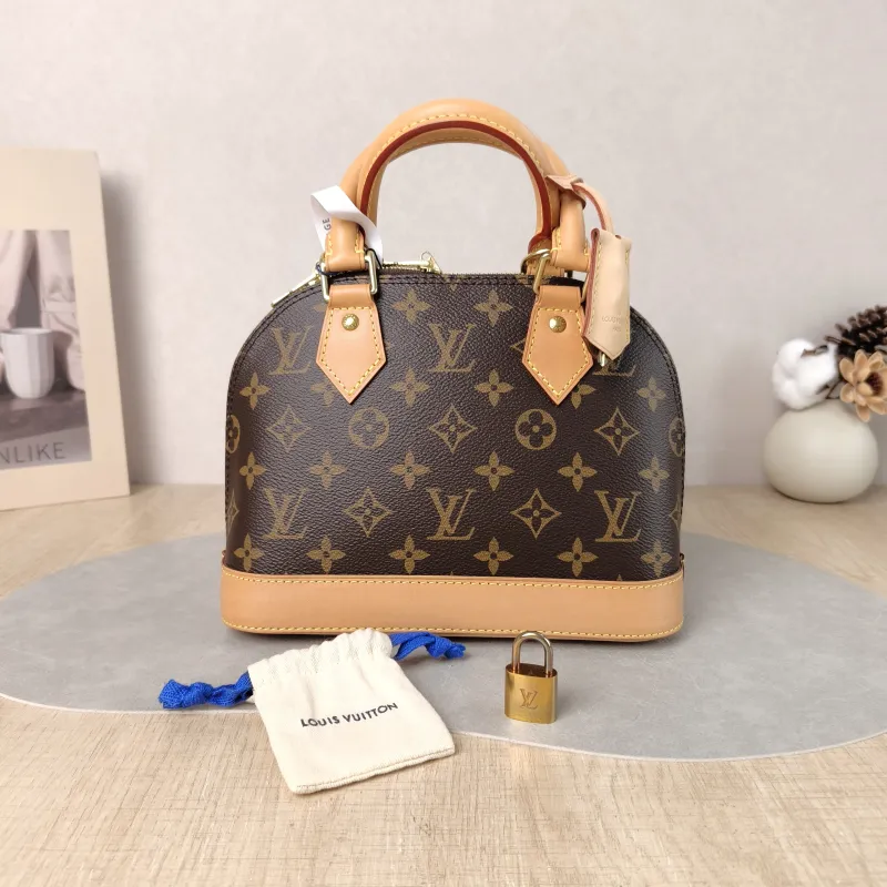 Louis Vuitton Crossbody Bag Alma BB Monogram PVC BB 23.5 × 11.5 × 17.5 cm — cover view 2 of 6