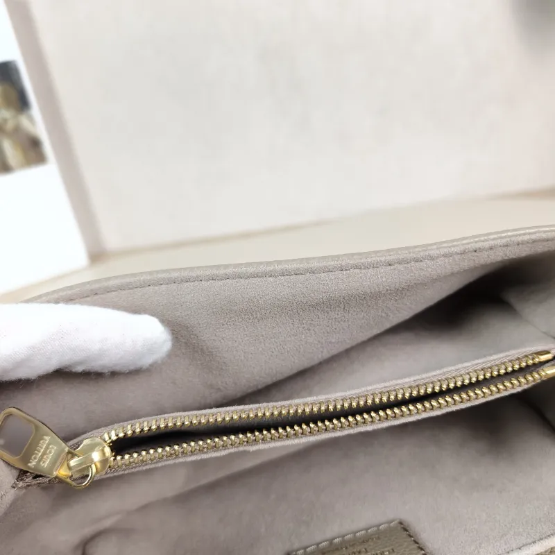 Louis Vuitton Crossbody Bag Pochette Métis East West Monogram Empreinte Embossed Calfskin Small 21.5 × 6 × 13.5 cm — detail view 8 of 13
