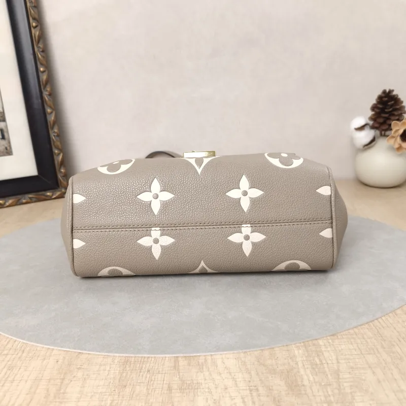 Louis Vuitton Crossbody Bag Favorite Empreinte Embossed Calfskin Monogram Medium24 × 9 × 14 cm — cover view 2 of 5