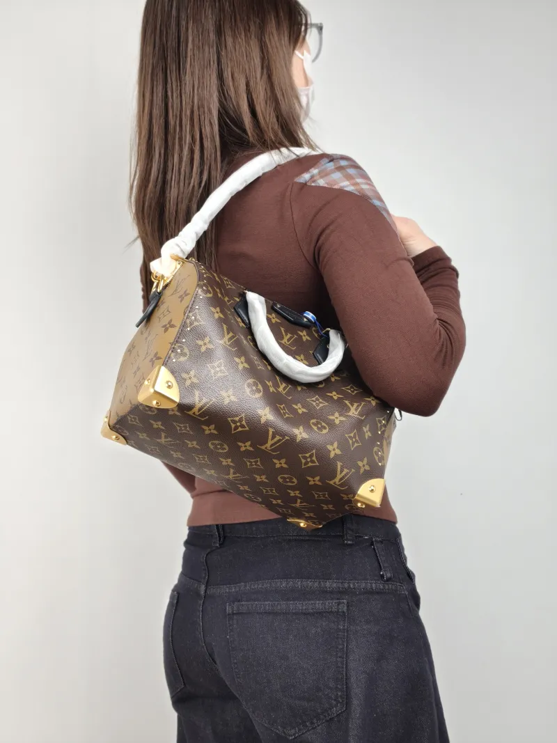 Louis Vuitton Shoulder Bag Speedy Trunk Monogram PVC One Size 27 × 15 × 20 cm — on-model view 1 of 2