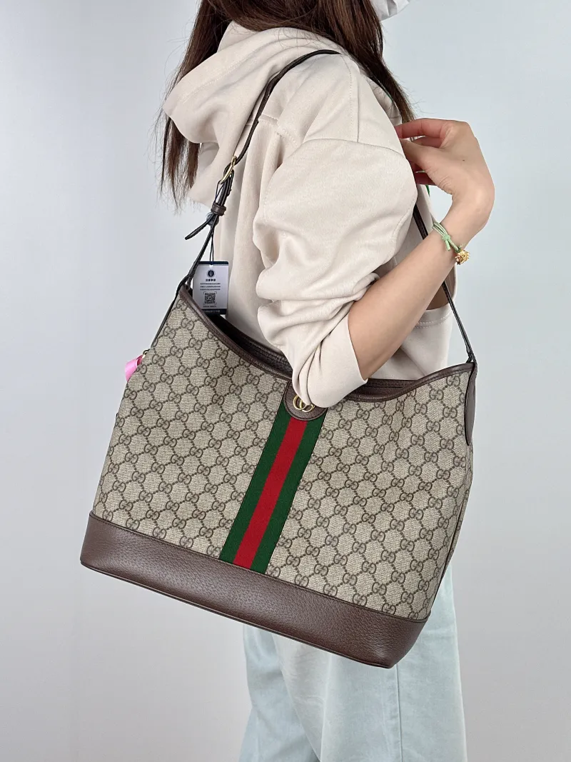 GUCCI Crossbody Bag ophidia Bucket Bag Monogram PVC One Size 34 × 16 × 31 cm — on-model view 2 of 2