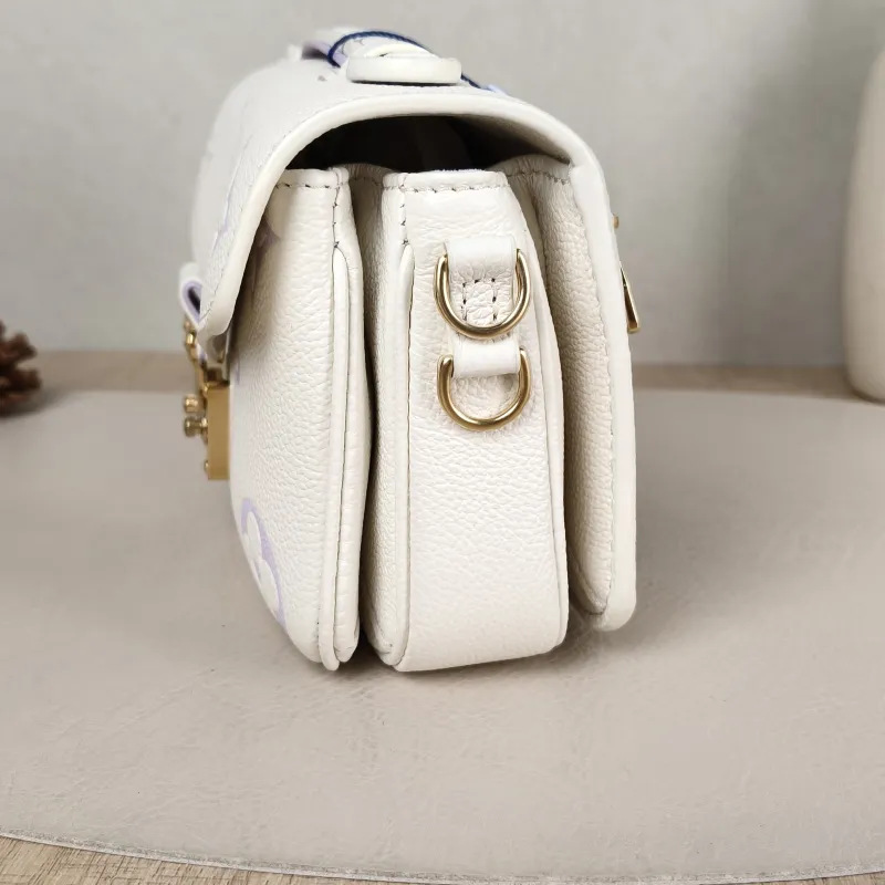 Louis Vuitton Crossbody Bag Pochette Métis East West White · Empreinte Embossed Calfskin Small 21.5 × 6 × 13.5 cm — detail view 7 of 14