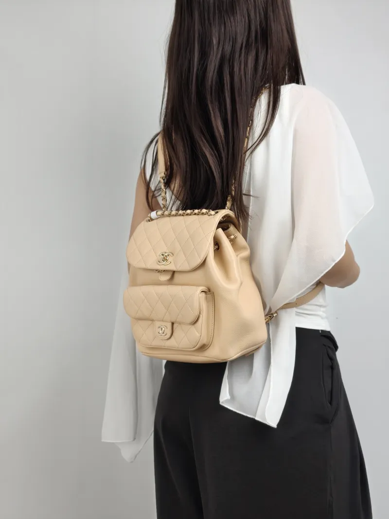 Chanel Backpack Duma Taupe Calfskin Large 21 × 13 × 23 cm — on-model view 2 of 3