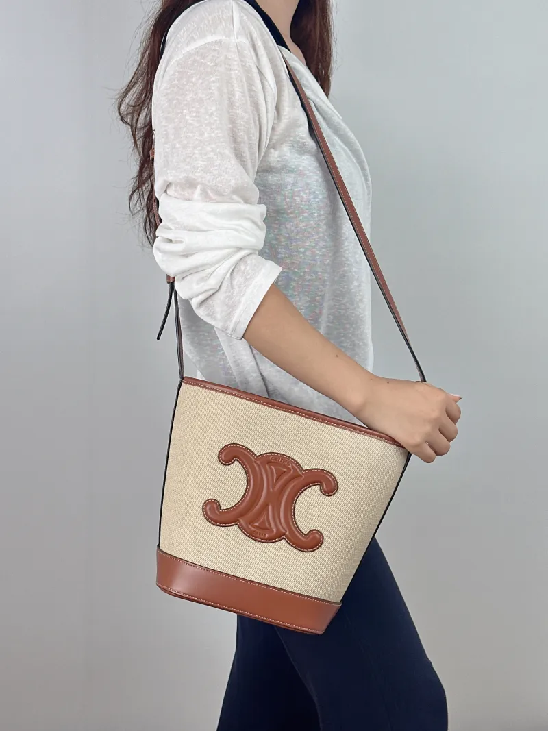 CELINE Shoulder Bag BUCKET TRIOMPHE Bucket Bag · Small 17 × 10 × 22 cm — on-model view 1 of 2